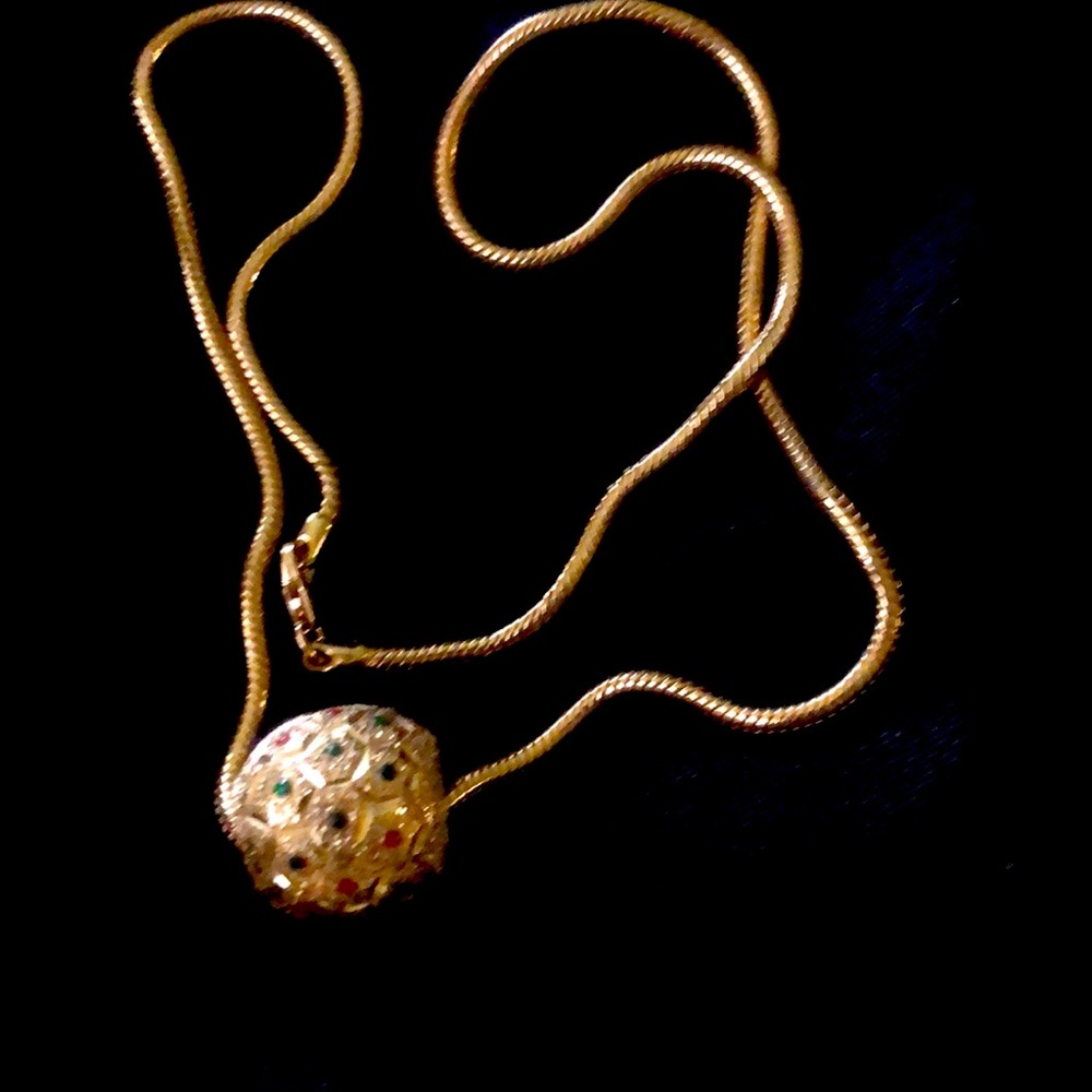 14 k snake chain with ball pendant that has small gems embedded another vintage.